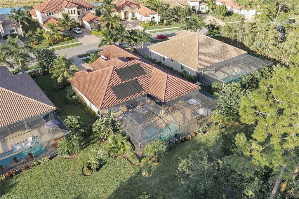 Undisclosed Address Naples, FL 34120 - Photo 25 of 33 an aerial view of a house