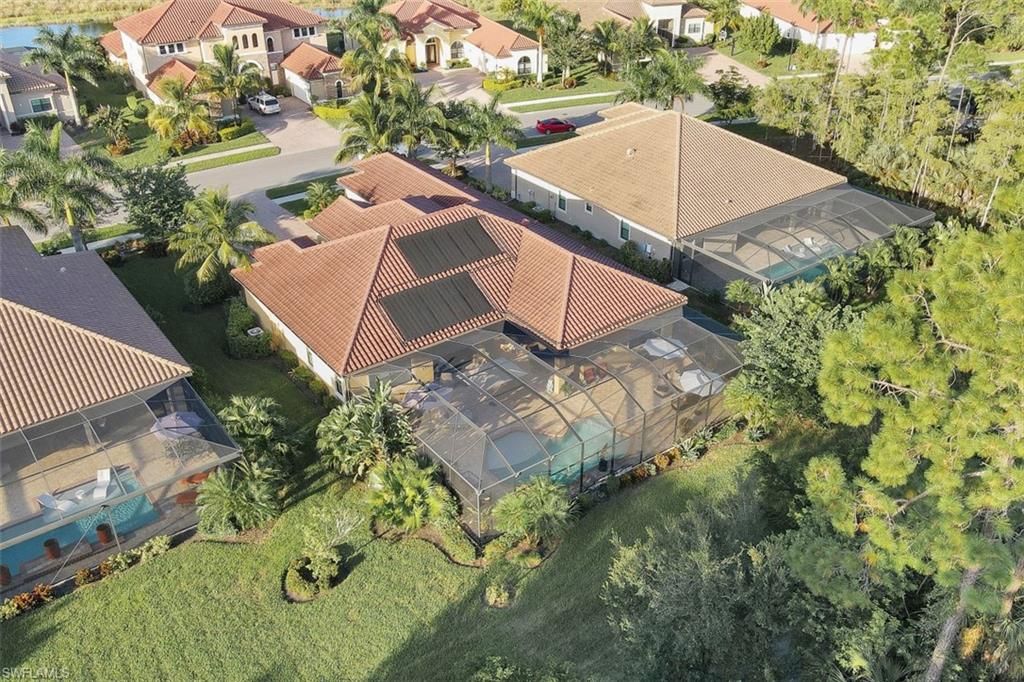 Undisclosed Address Naples, FL 34120 - Photo 30 of 33 an aerial view of a house
