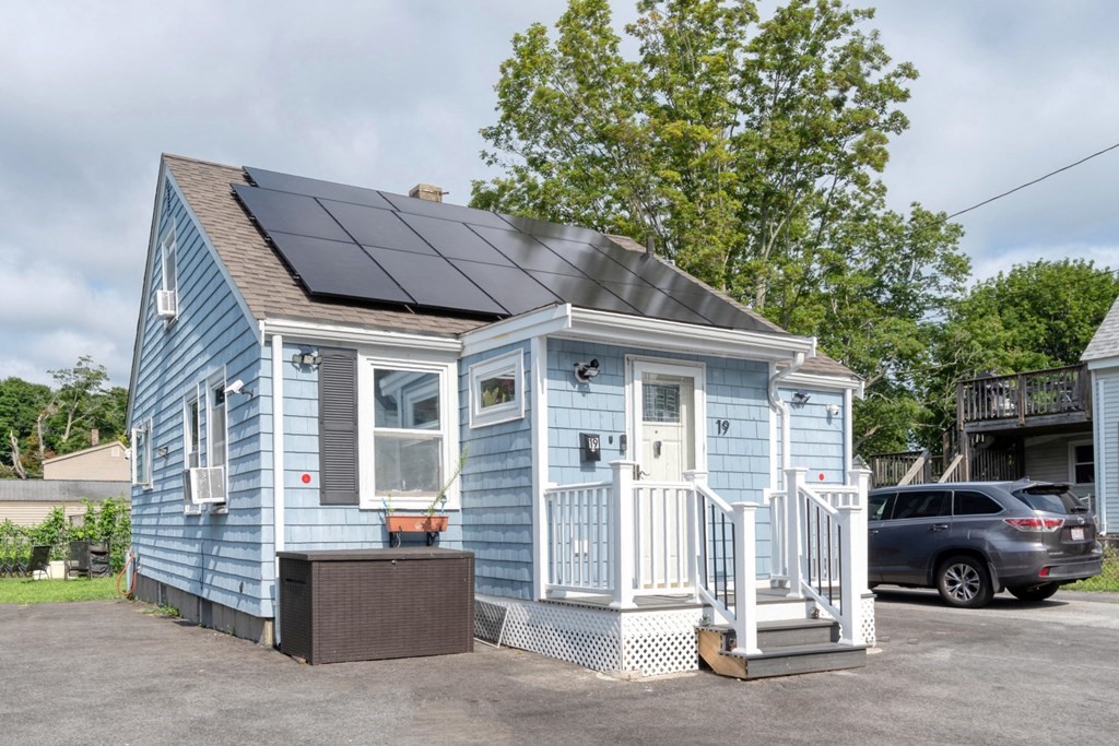 19 Crescent Road Weymouth, MA 02191 - Photo 2 of 24 a front view of a house with a parking space