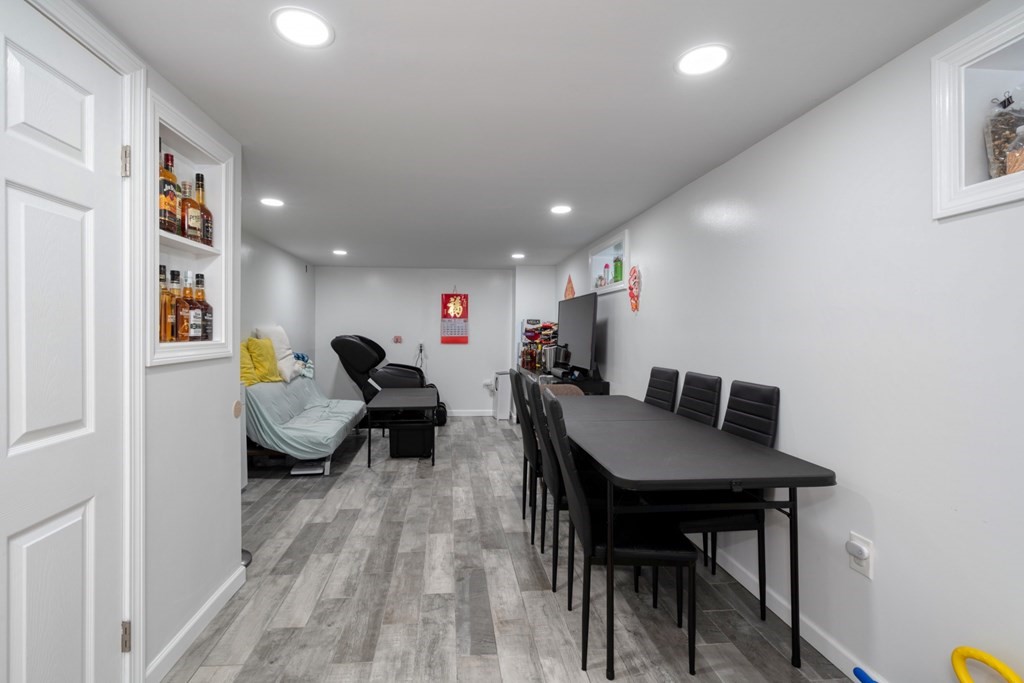 19 Crescent Road Weymouth, MA 02191 - Photo 10 of 24 a living room with furniture and a table