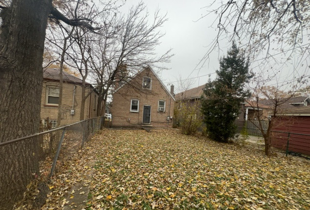 9606 South Morgan Street Chicago, IL 60643 - Photo 4 of 16 a front view of a house with a yard