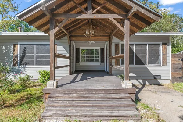 a front view of a house with a porch