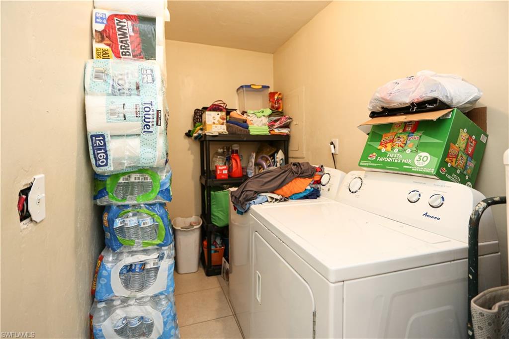 5140 20th Court Southwest Naples, FL 34116 - Photo 27 of 33 a utility room with dryer and washer