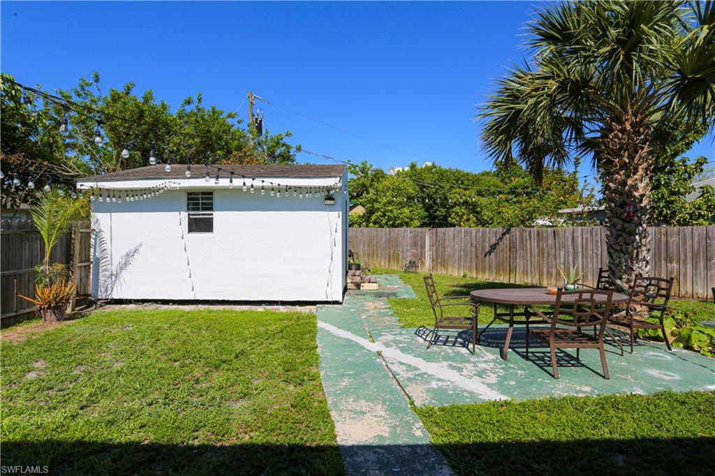 5140 20th Court Southwest Naples, FL 34116 - Photo 31 of 33 an outdoor sitting area with golf course
