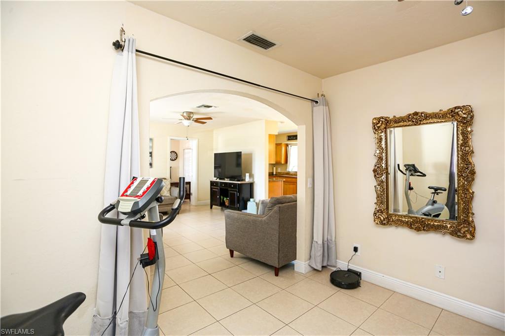 5140 20th Court Southwest Naples, FL 34116 - Photo 8 of 33 a view of a livingroom with furniture and windows