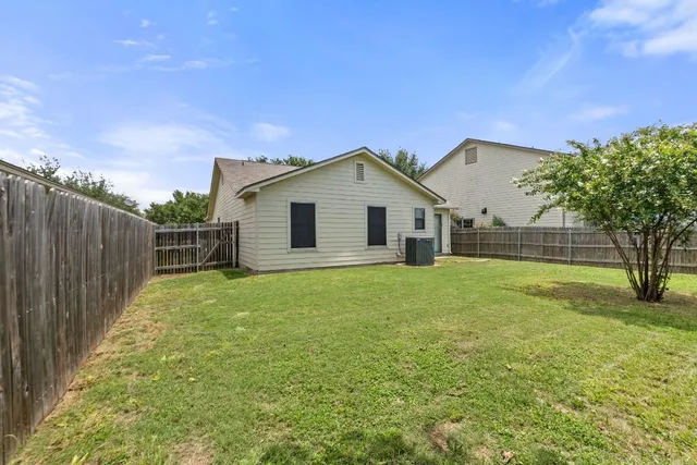 a view of a backyard with a garden