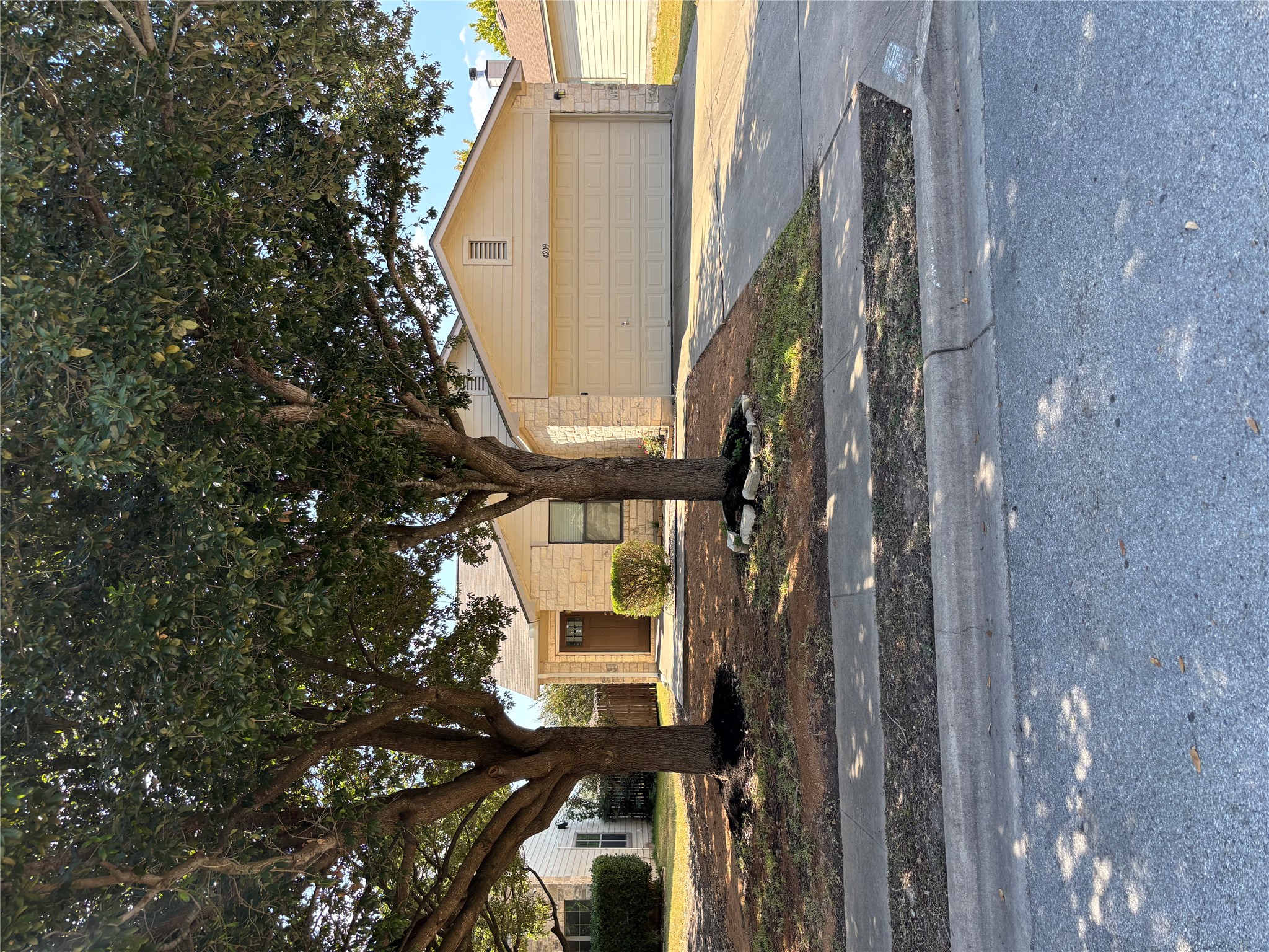 4209 Glacier Point Cove Taylor, TX 76574 - Photo 36 of 36 a front view of a house with a yard and garage
