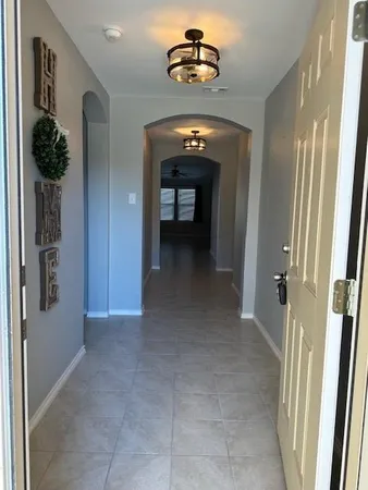 a view of a hallway with closet