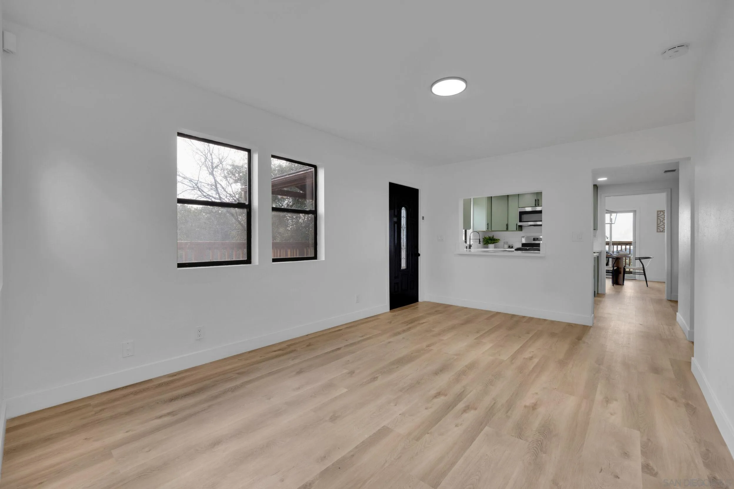 2657 Payson Drive Julian, CA 92036 - Photo 13 of 43 a view of empty room with wooden floor and fan