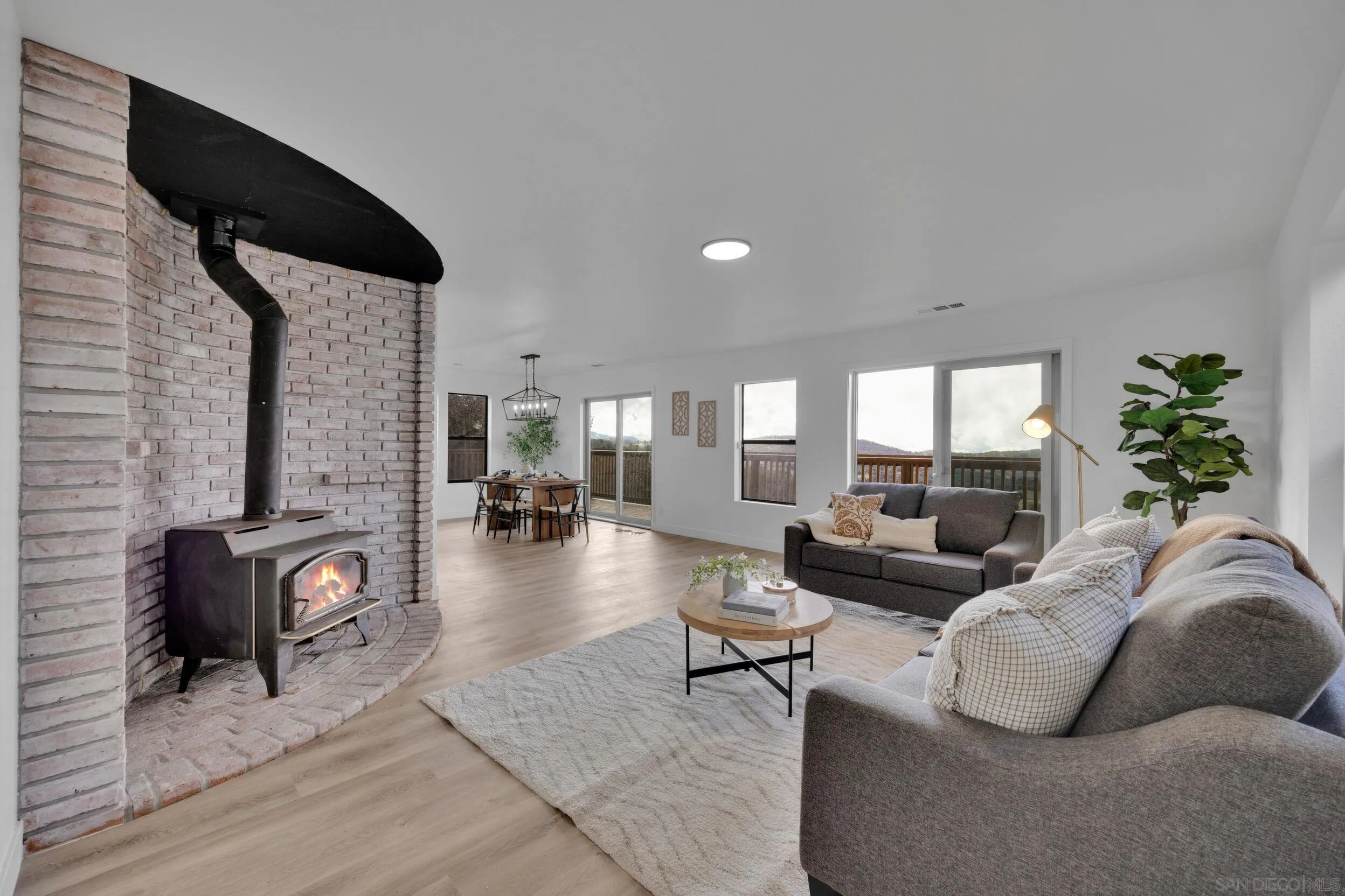 2657 Payson Drive Julian, CA 92036 - Photo 16 of 43 a living room with furniture and a fireplace