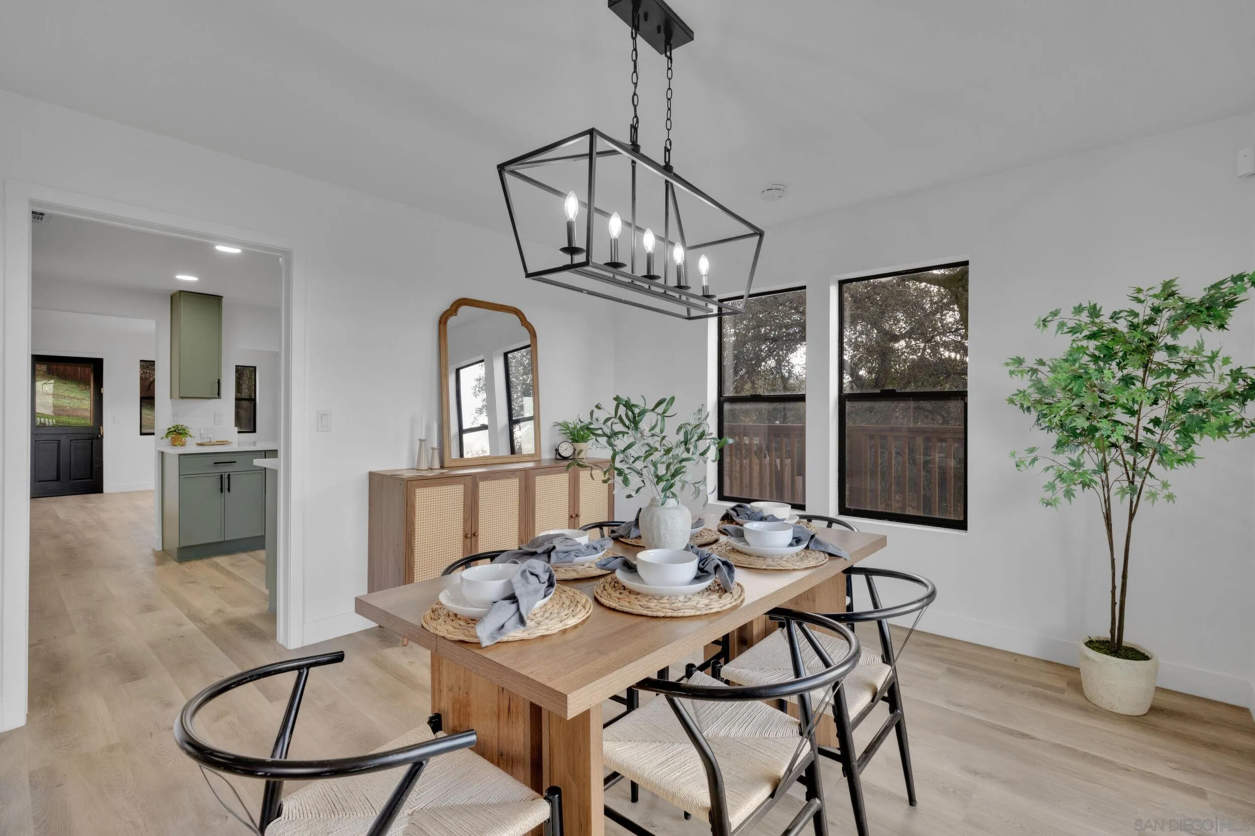 2657 Payson Drive Julian, CA 92036 - Photo 20 of 43 a view of a dining room with furniture window and wooden floor