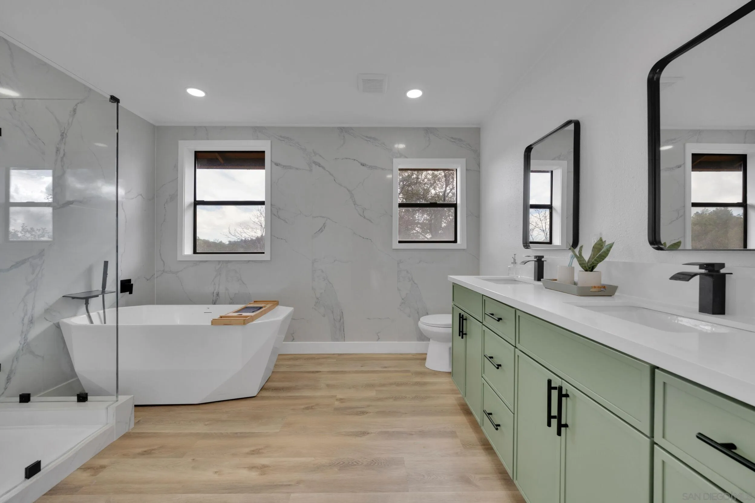 2657 Payson Drive Julian, CA 92036 - Photo 26 of 43 a spacious bathroom with double vanity a bathtub a mirror a vanity and a shower