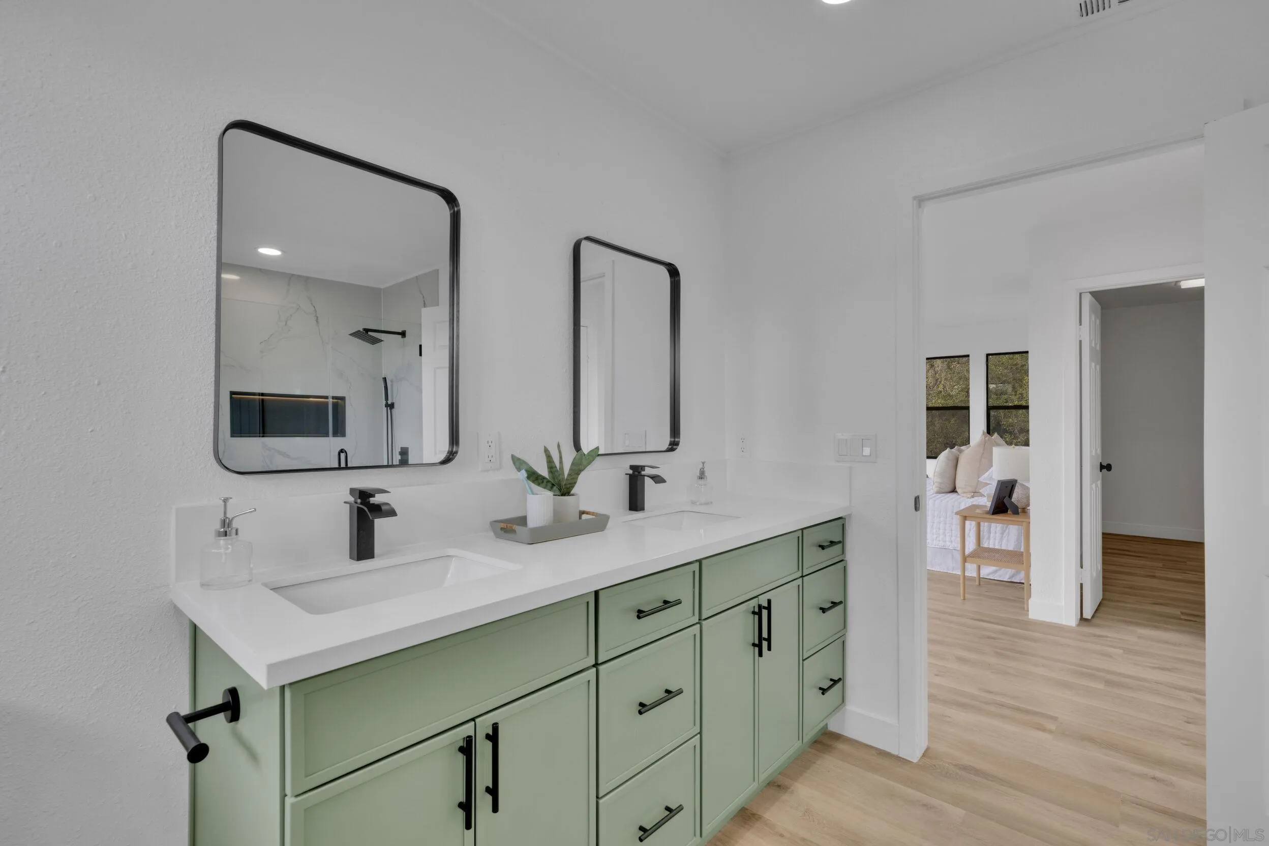 2657 Payson Drive Julian, CA 92036 - Photo 28 of 43 a bathroom with a double vanity sink and a mirror