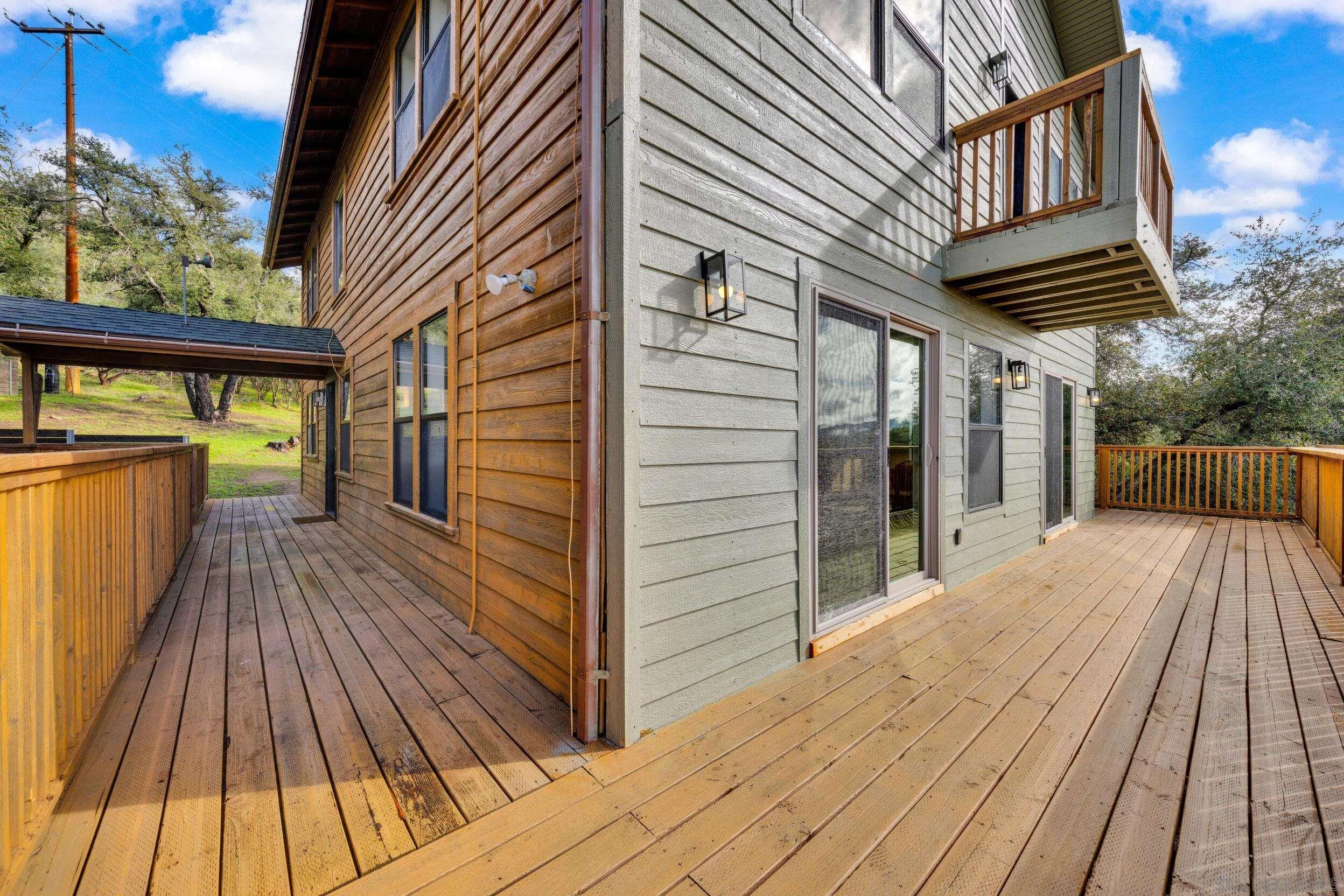 2657 Payson Drive Julian, CA 92036 - Photo 33 of 43 a view of backyard with a deck and wooden floor
