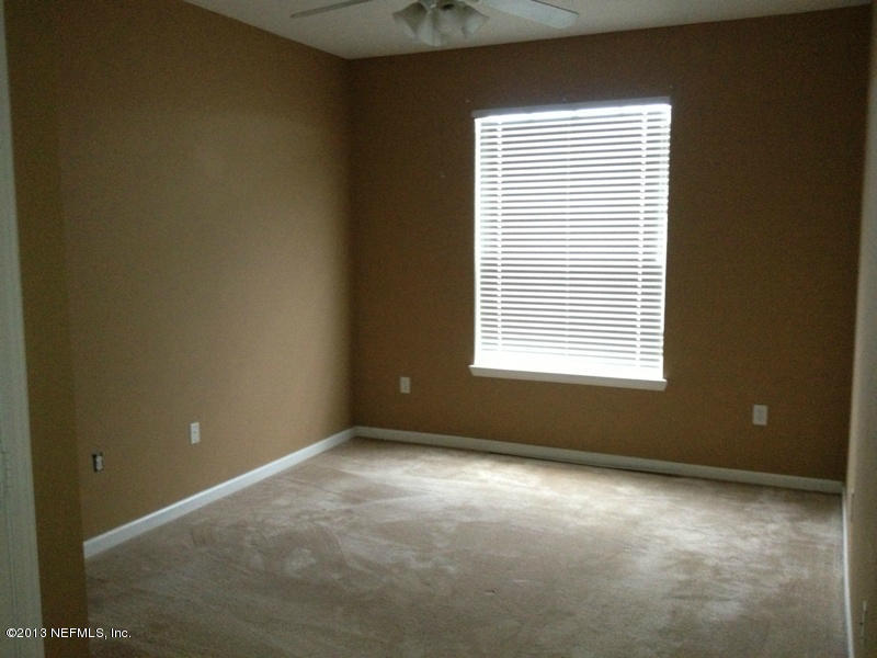 7990 Baymeadows Road East, Unit 426 Jacksonville, FL 32256 - Photo 14 of 14 a view of an empty room with a window