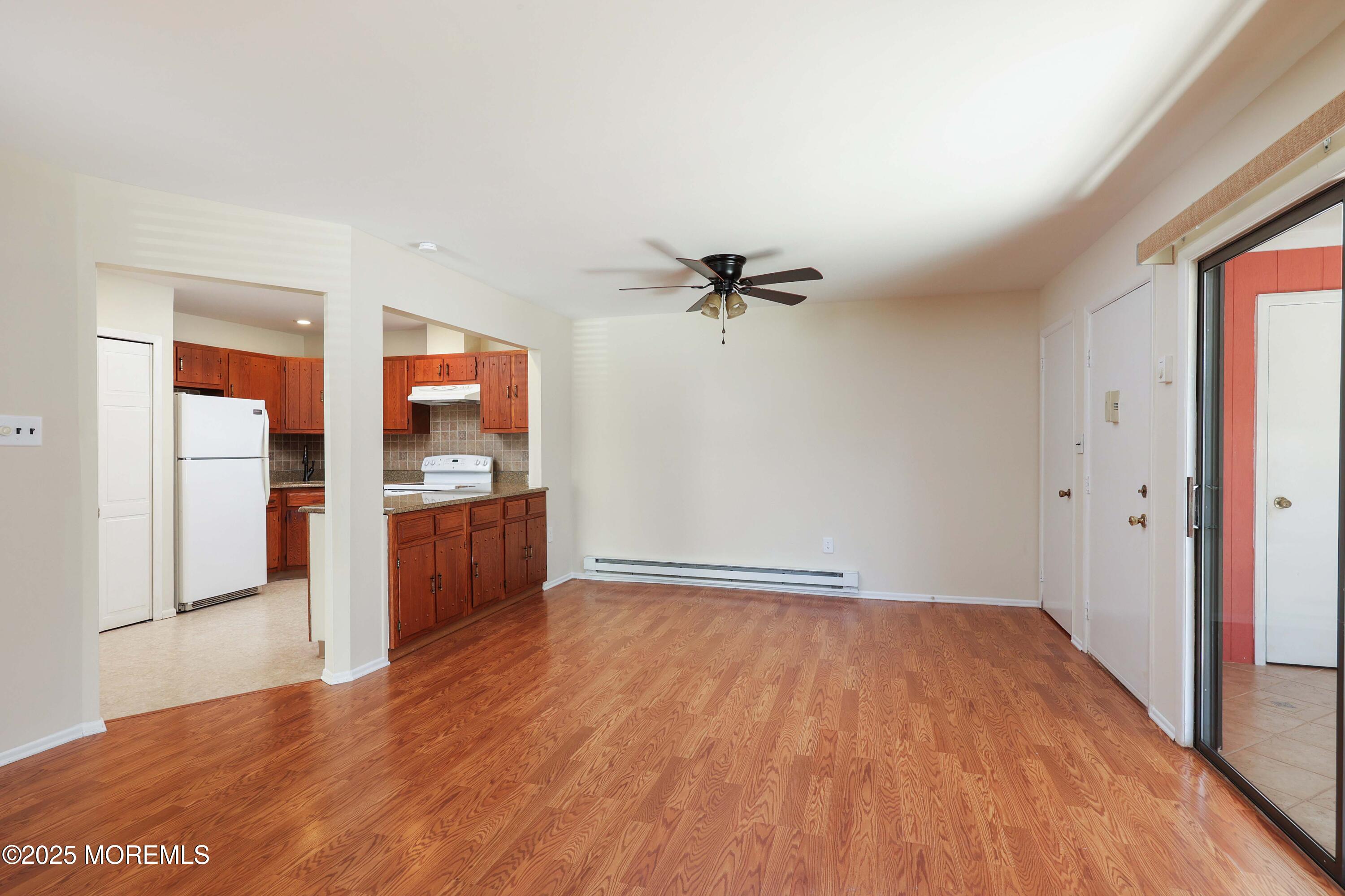 109 Lexington Court Red Bank, NJ 07701 - Photo 13 of 62 a view of a kitchen with wooden floor and a kitchen