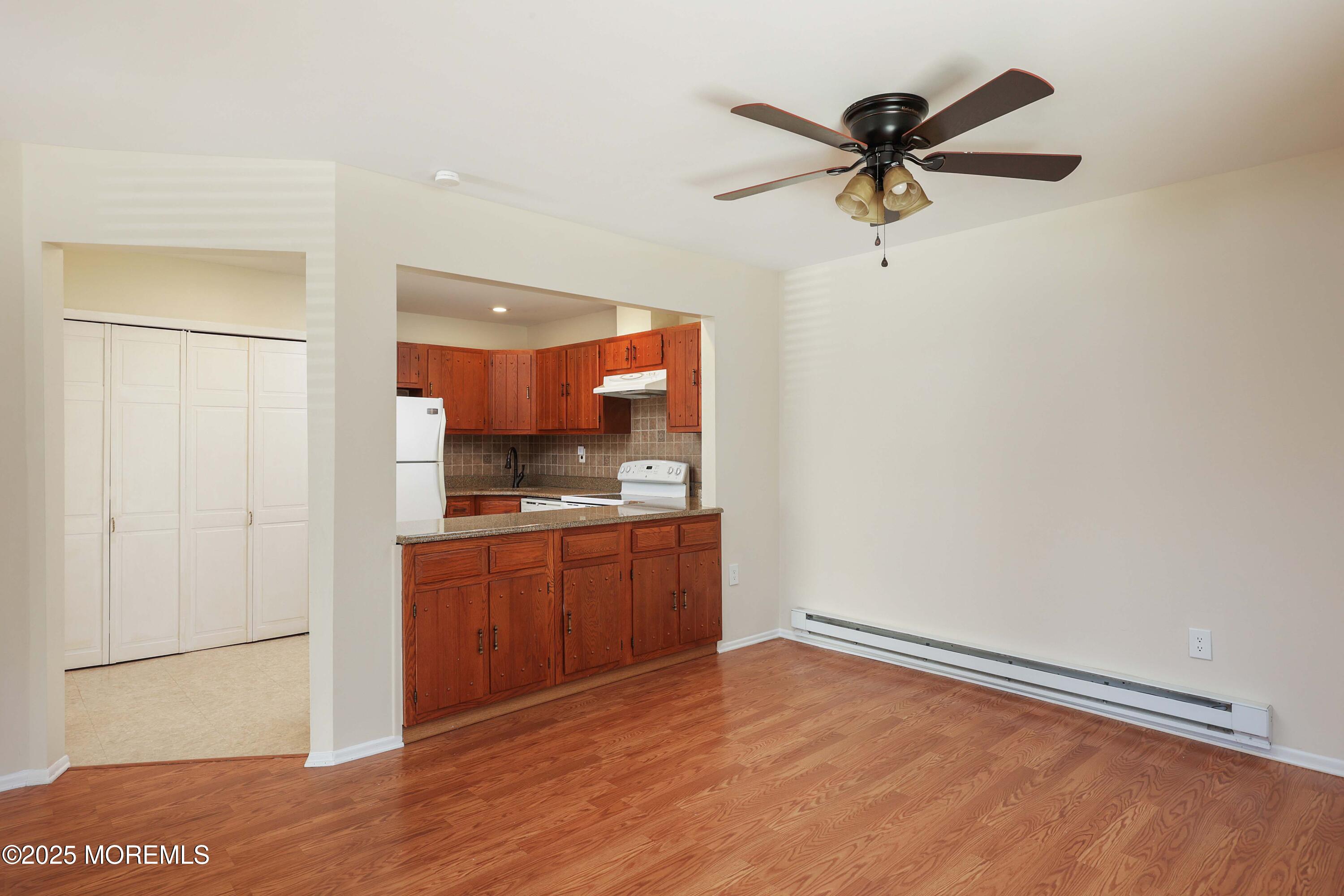 109 Lexington Court Red Bank, NJ 07701 - Photo 15 of 62 a kitchen with a refrigerator and a sink