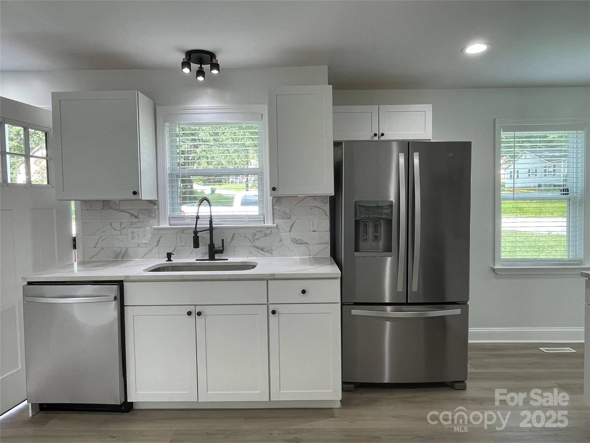 210 River Drive Gaffney, SC 29340 - Photo 7 of 18 a kitchen with stainless steel appliances a refrigerator and a sink