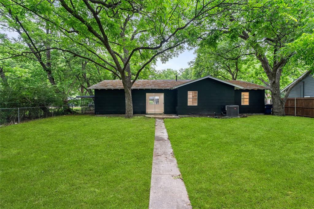 110 Hackberry Street Lancaster, TX 75146 - Photo 26 of 32 Expansive green lawn with mature trees providing ample shade
