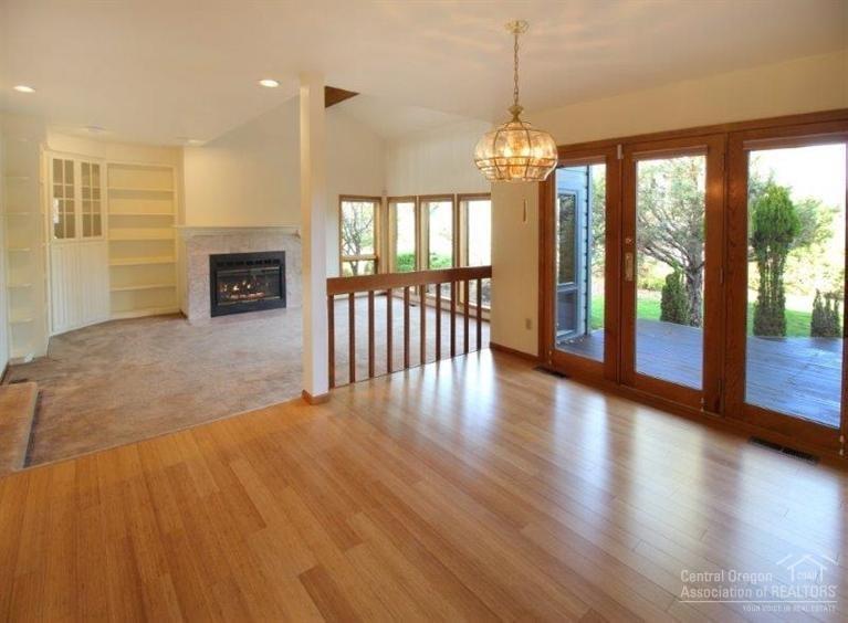 62593 Quail Ridge Road Bend, OR 97701 - Photo 6 of 25 Dining room and living room with gas fir