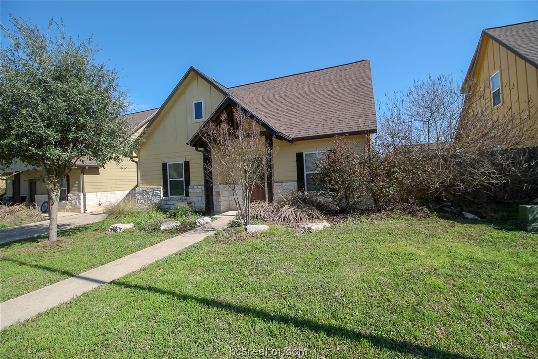 3361 Keefer Loop College Station, TX 77845 - Photo 1 of 1 a front view of a house with a yard and garage