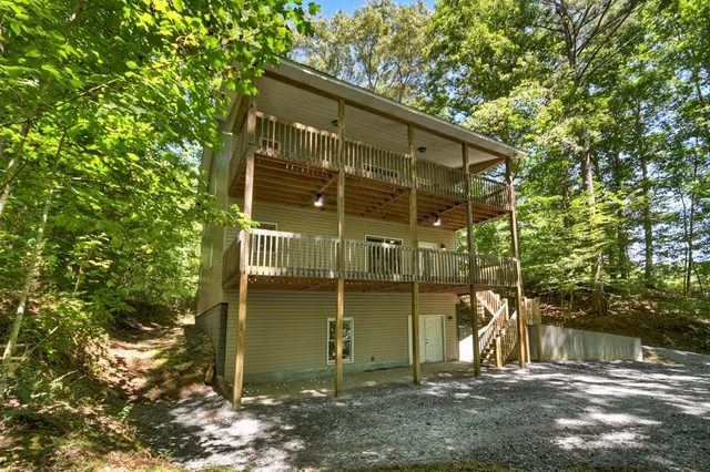 a backyard of a house with lots of green space