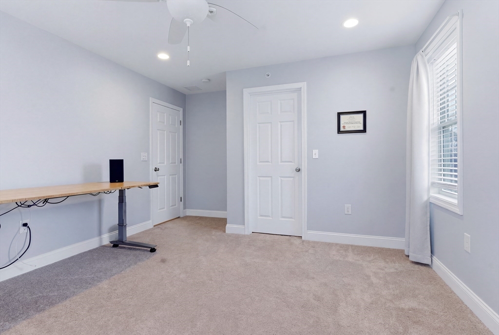 10 North Court Street, Unit 3 Fall River, MA 02720 - Photo 16 of 25 a view of an empty room with a window