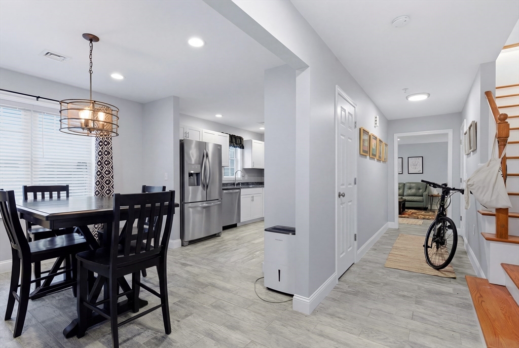 10 North Court Street, Unit 3 Fall River, MA 02720 - Photo 5 of 25 a view of a dining room with furniture table and chairs