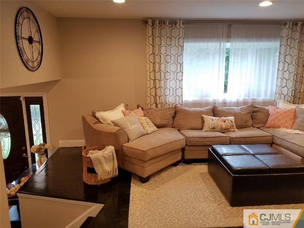 21 Barker Road Somerset, NJ 08873 - Photo 9 of 25 a living room with furniture and a window