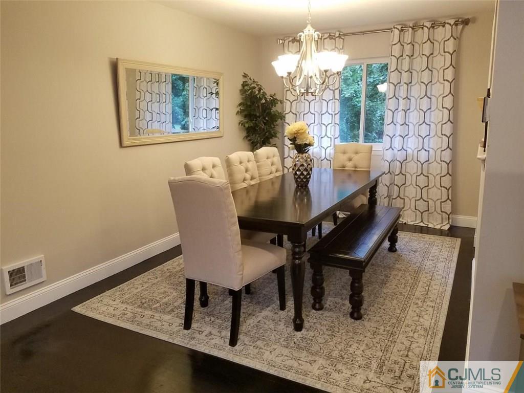 21 Barker Road Somerset, NJ 08873 - Photo 10 of 25 a dining room with furniture and window