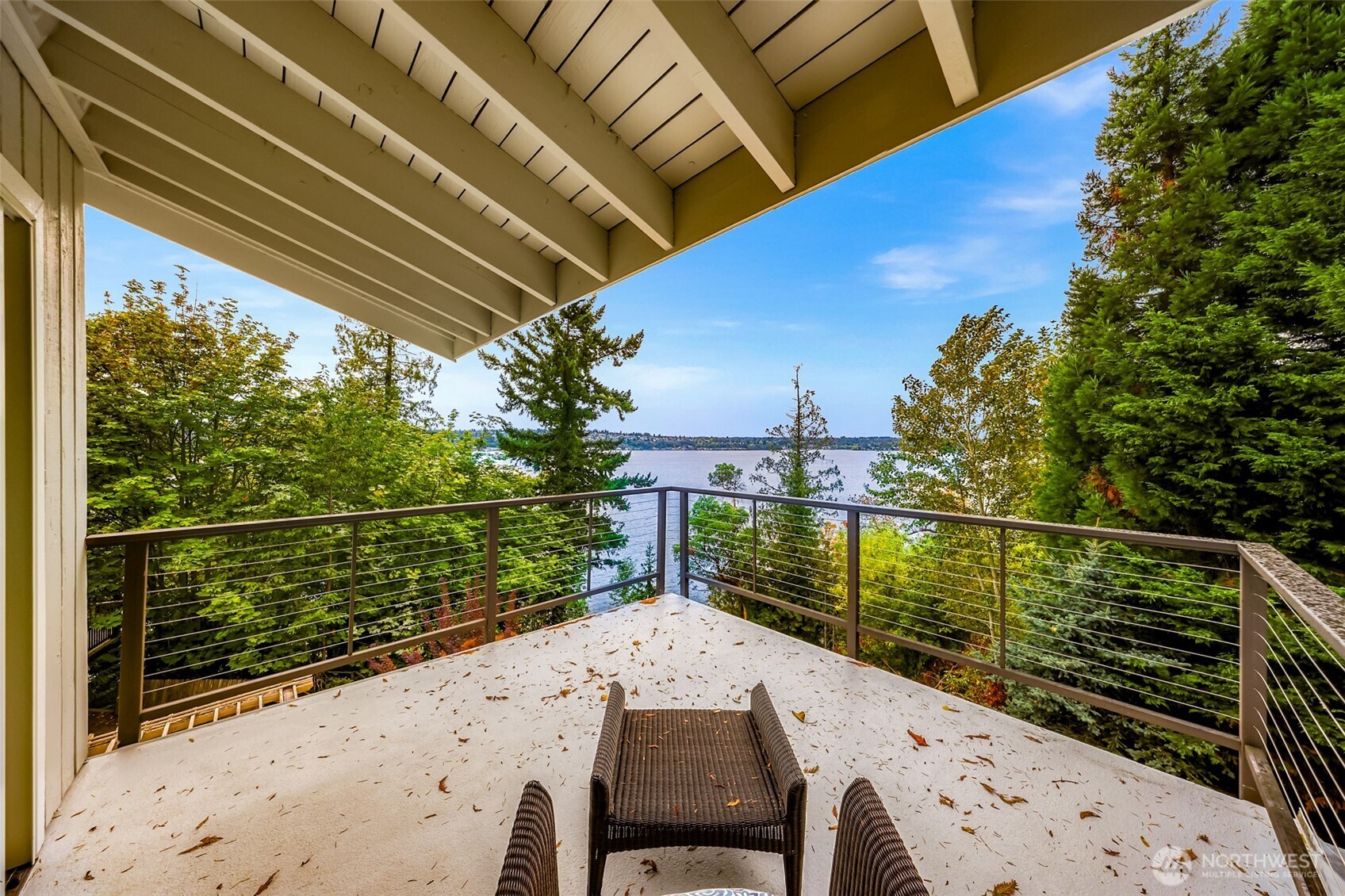8449 West Mercer Way Mercer Island, WA 98040 - Photo 18 of 40 a view of a balcony with wooden floor and outdoor seating