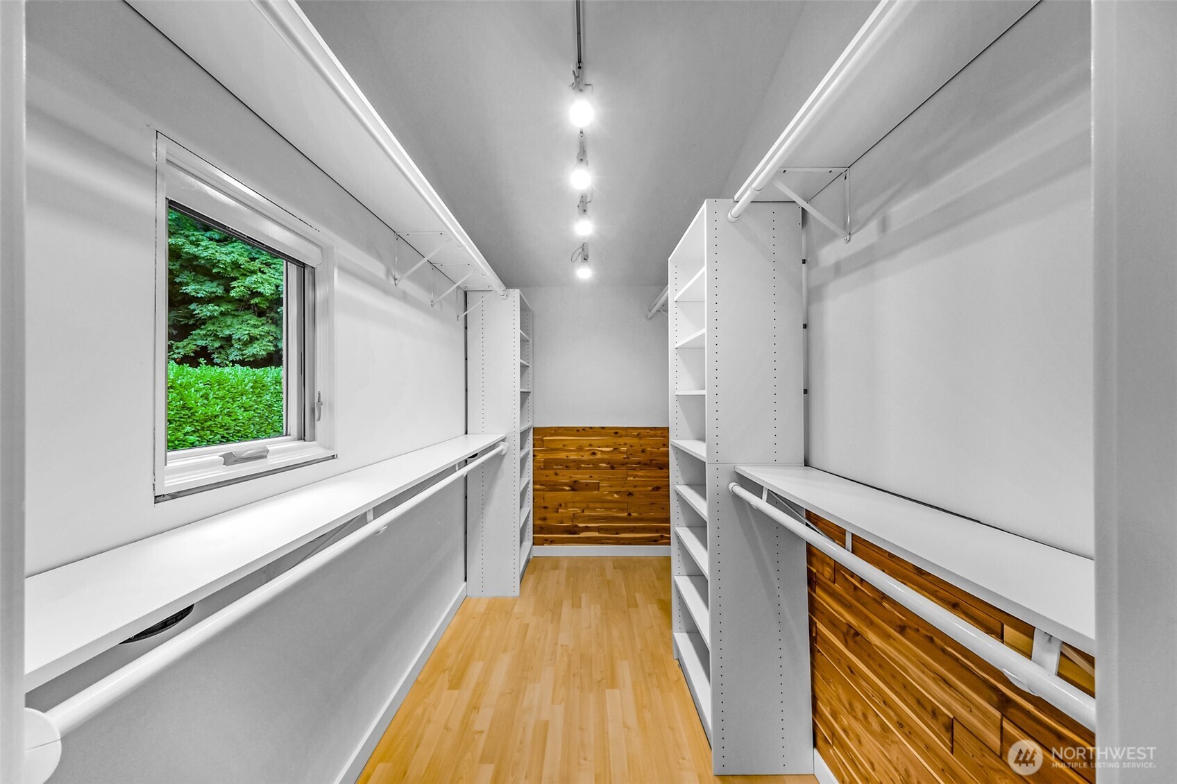 8449 West Mercer Way Mercer Island, WA 98040 - Photo 19 of 40 a view of a kitchen with wooden floor and electronic appliances