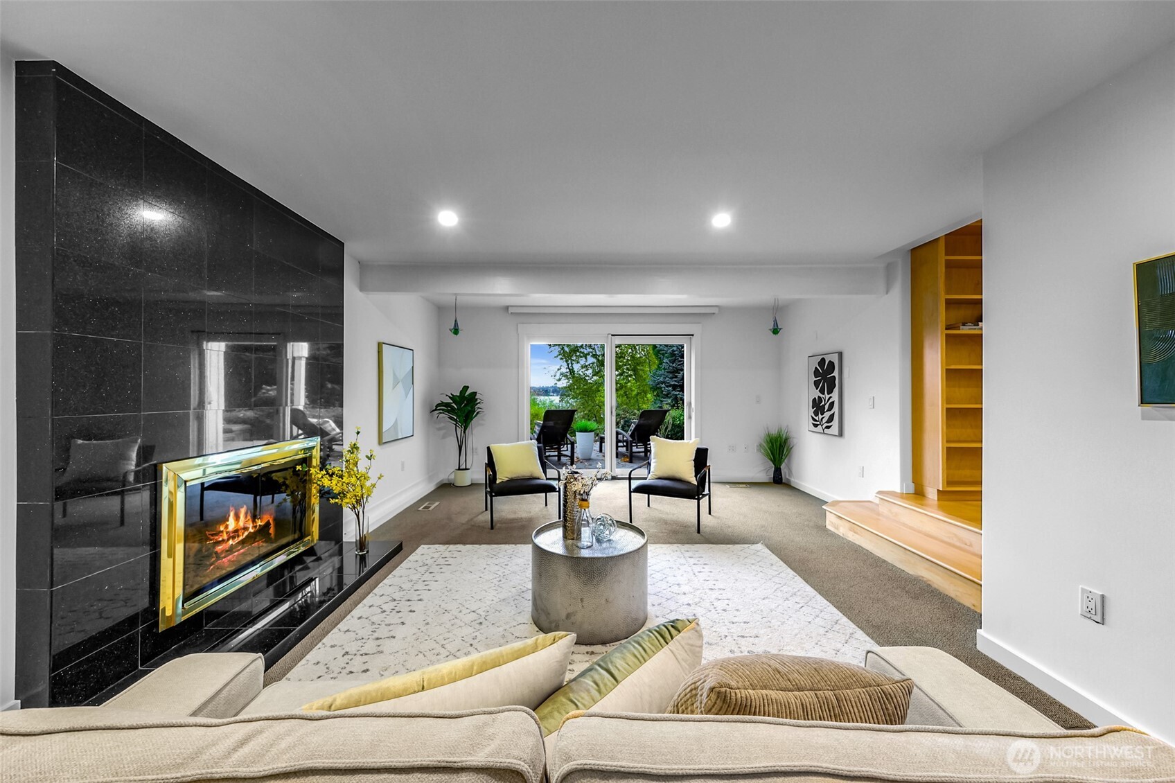 8449 West Mercer Way Mercer Island, WA 98040 - Photo 30 of 40 a living room with fireplace furniture and a large window