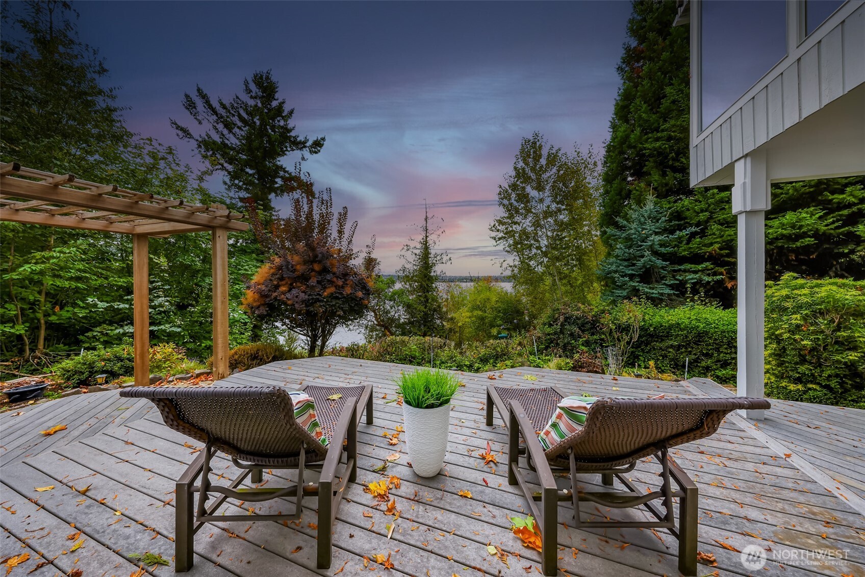 8449 West Mercer Way Mercer Island, WA 98040 - Photo 31 of 40 a view of a table and chairs on the roof deck