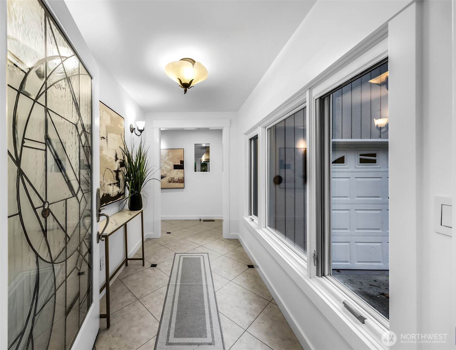 8449 West Mercer Way Mercer Island, WA 98040 - Photo 4 of 40 a view of an entryway with a livingroom