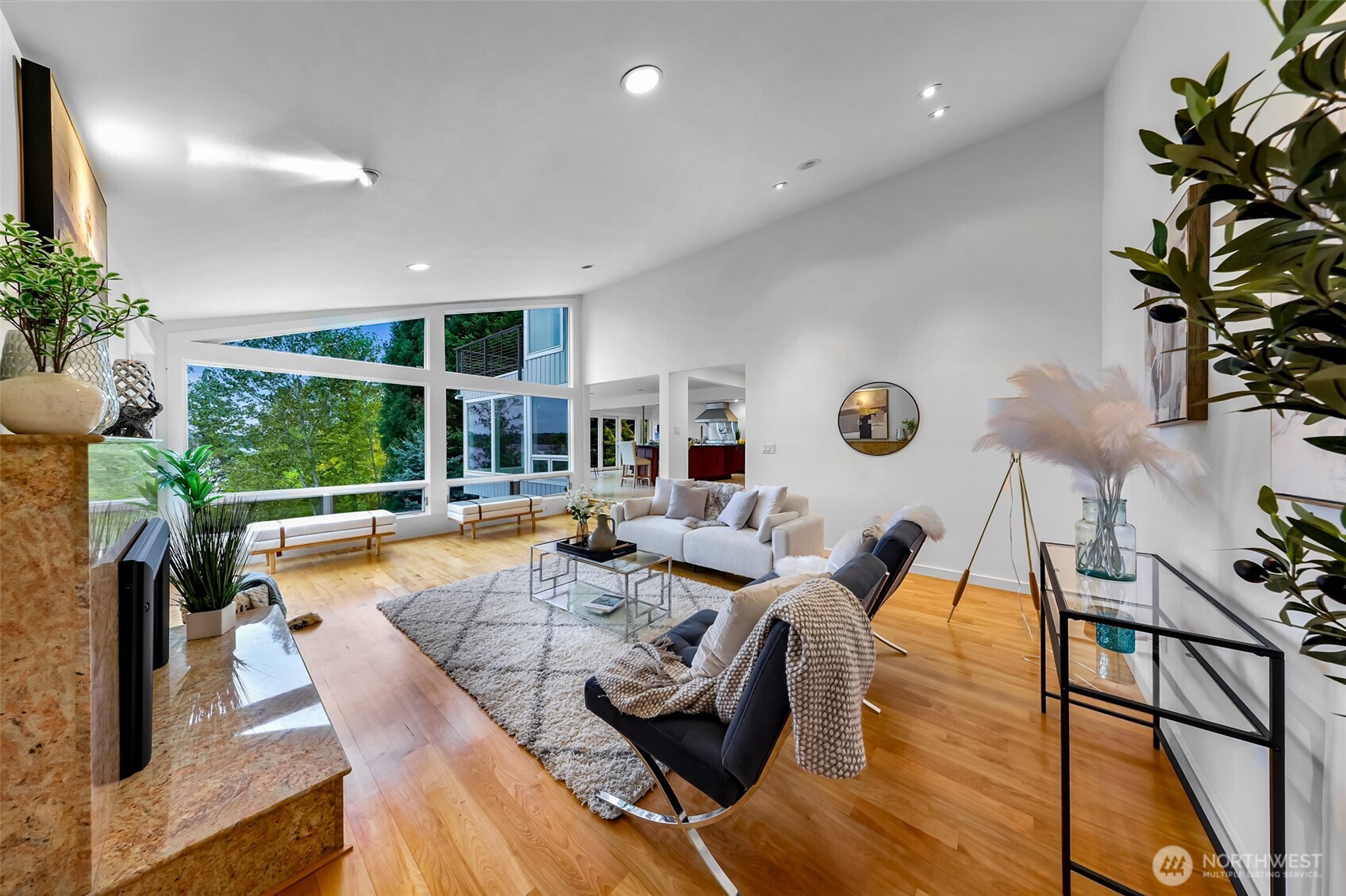 8449 West Mercer Way Mercer Island, WA 98040 - Photo 5 of 40 a view of a dining room with furniture window and outside view