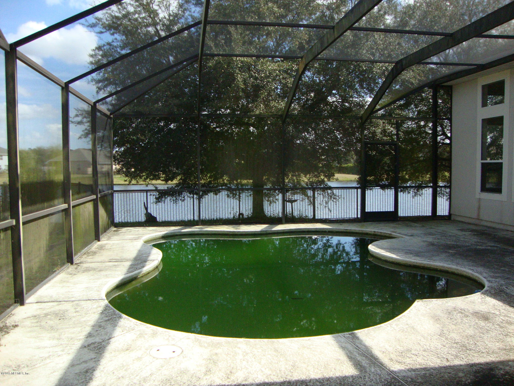 6106 Wakulla Springs Road Jacksonville, FL 32258 - Photo 29 of 30 Caged Pool over looking the lake