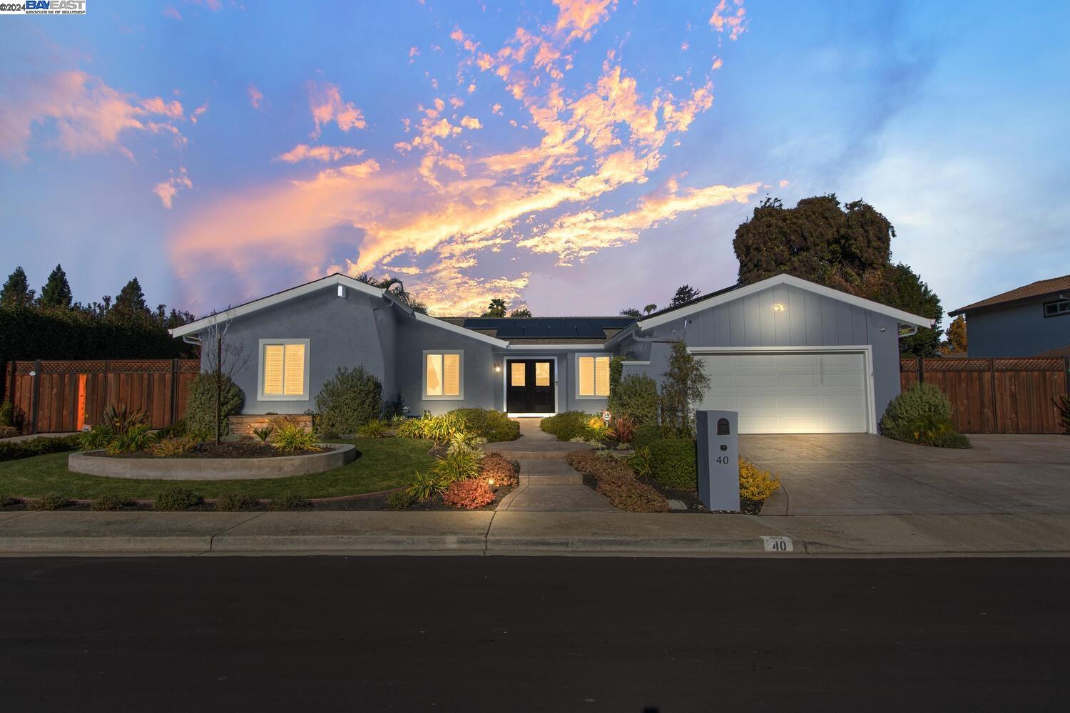 40 Dos Rios Court San Ramon, CA 94583 - Photo 1 of 1 a front view of a house with yard and parking