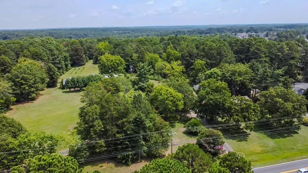 1112 Harbins Road Dacula, GA 30019 - Photo 3 of 13 a view of a lake with a city view