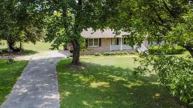 a view of a lake with a yard