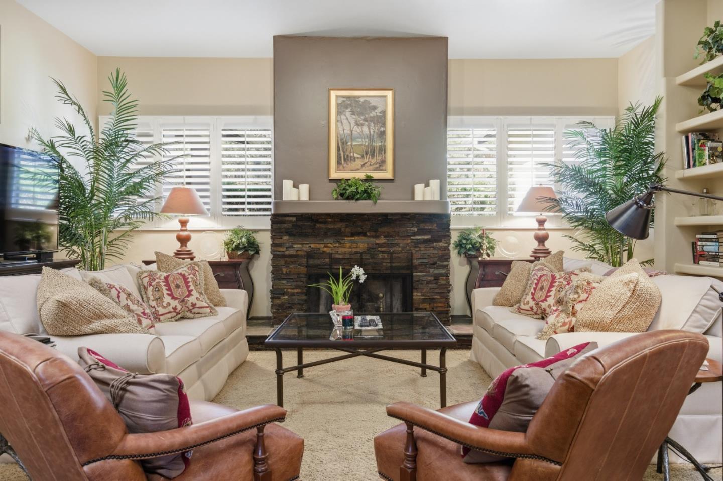 1155 Lookout Road Pebble Beach, CA 93953 - Photo 13 of 33 a living room with furniture and a fireplace