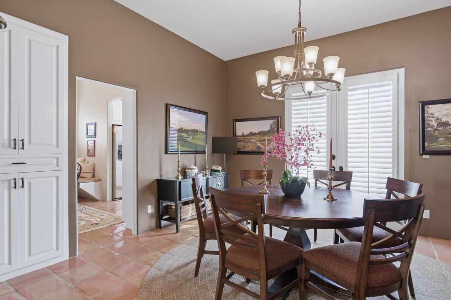 1155 Lookout Road Pebble Beach, CA 93953 - Photo 15 of 33 a view of a dining room with furniture window and wooden floor