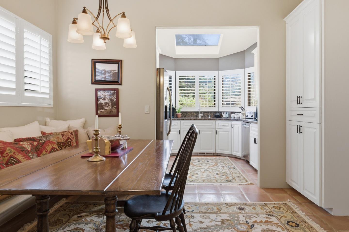1155 Lookout Road Pebble Beach, CA 93953 - Photo 16 of 33 a view of a dining room with furniture window and wooden floor