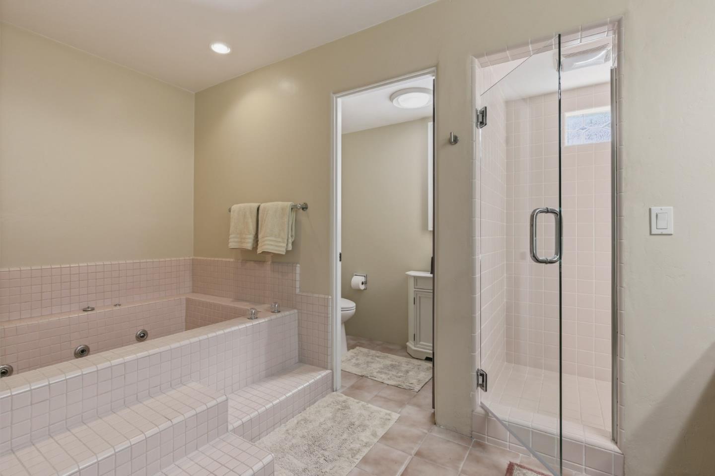 1155 Lookout Road Pebble Beach, CA 93953 - Photo 23 of 33 a bathroom with a bathtub and shower