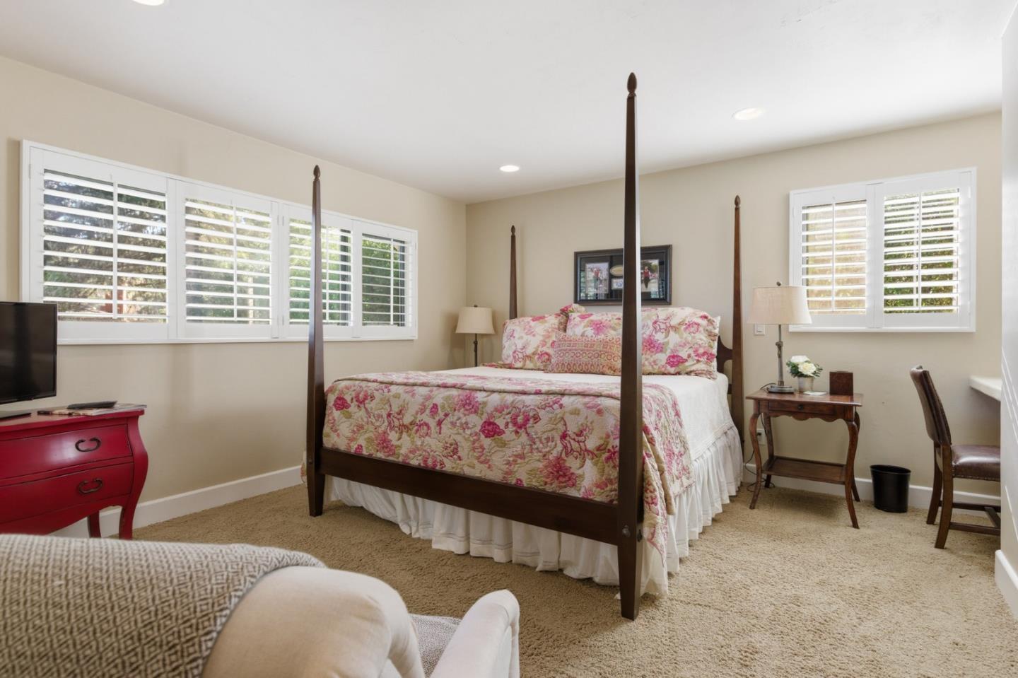 1155 Lookout Road Pebble Beach, CA 93953 - Photo 26 of 33 a bedroom with a bed window and chair
