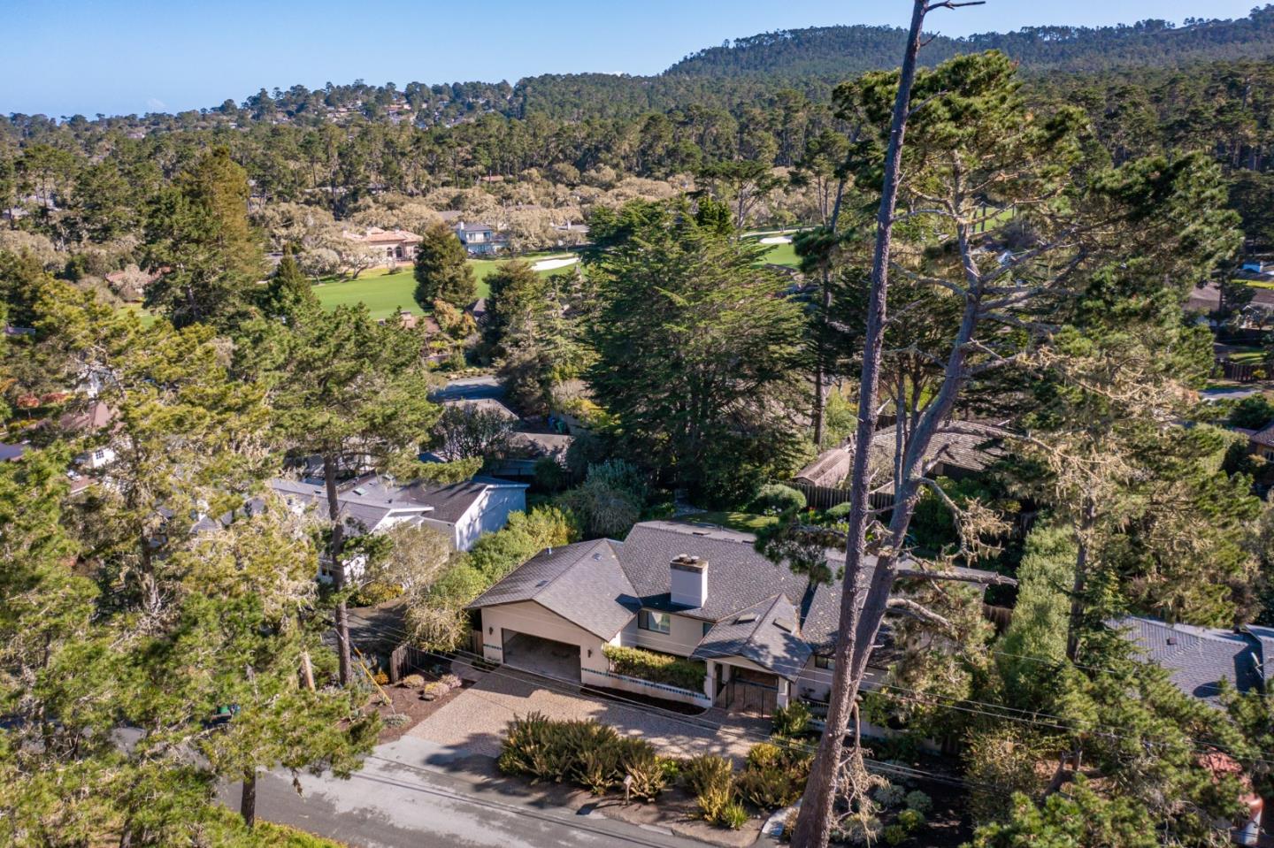 1155 Lookout Road Pebble Beach, CA 93953 - Photo 4 of 33 an aerial view of a house with a yard