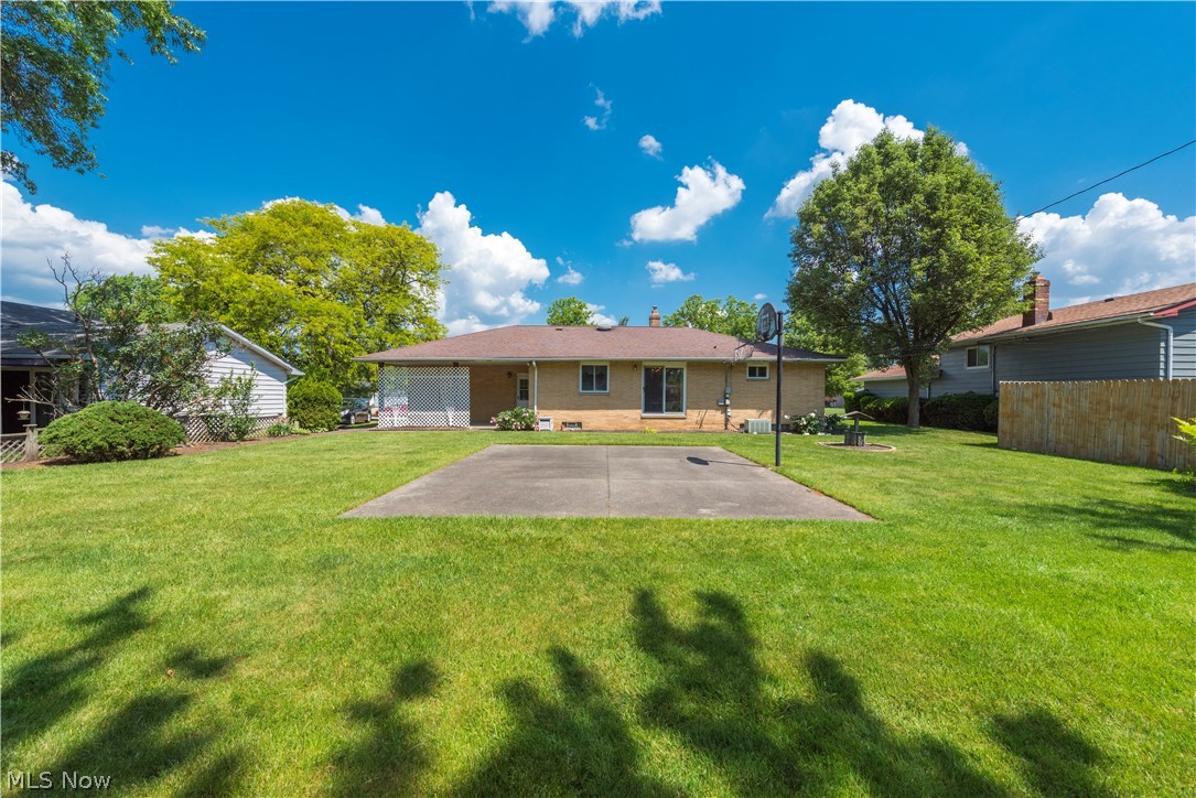 13617 Sheldon Road Cleveland, OH 44130 - Photo 31 of 36 Rear view of house with a patio area and a yard