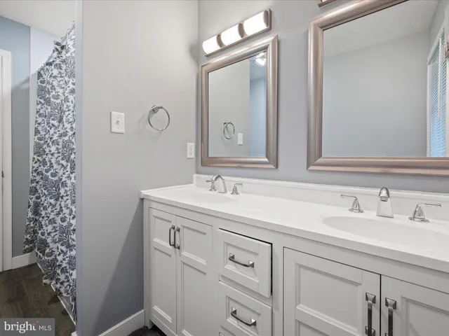 a bedroom with a bed and a view of bedroom