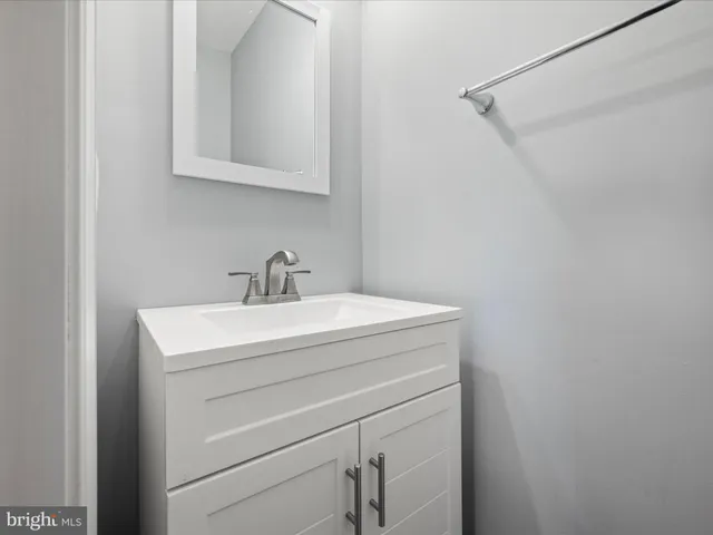 a view of staircase with white walls