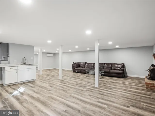 a view of a livingroom with wooden floor